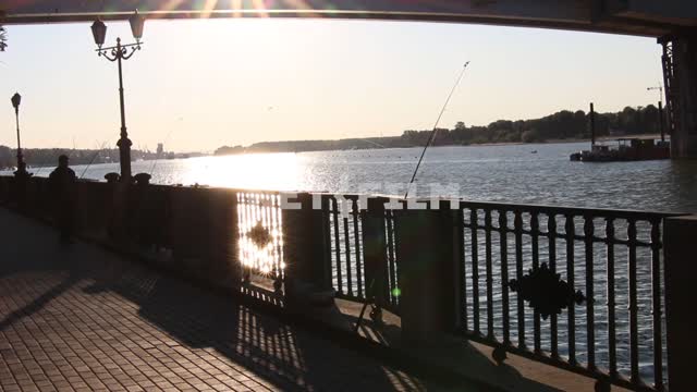 The waterfront views.
River, water, waterfront, fishing rod, fishing rods, lights, bridge, Bank...