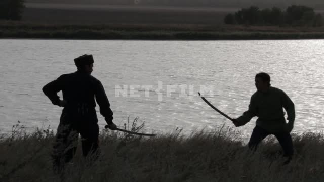 The Cossacks trained with swords.
The Cossacks, men, swords, hat, river, field, grass, summer,...