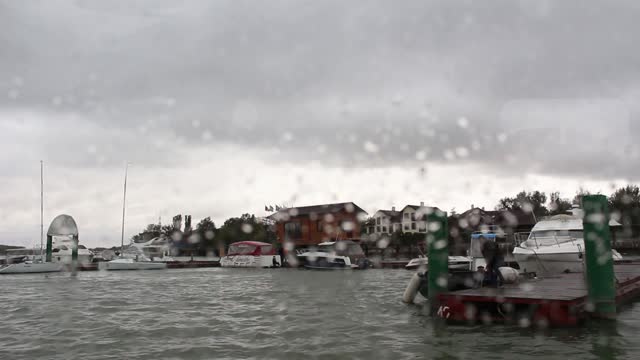 The view from the porthole on the port.
Port, Marina, ship, boat, yacht, porthole, window, rain,...