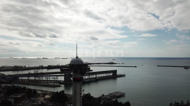 Аэросъемка, съемка коптером,  вид сверху - главная набережная  города Туапсе. Часть порта, море,...