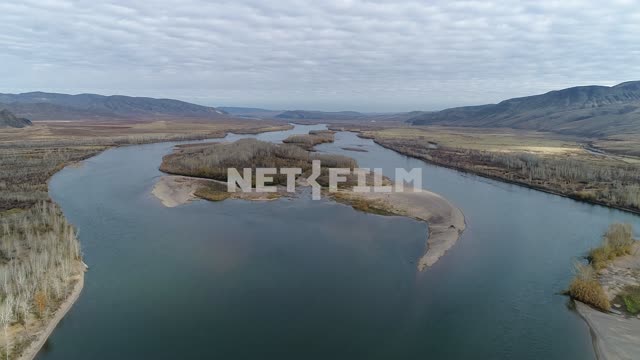 Aerial photo, survey copter, from a height of bird flight, mountains, hills, river.
River with...