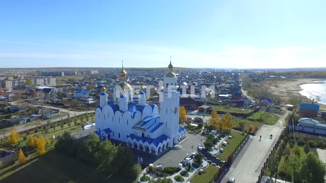 Aerial photo, survey copter, the lake and the town of Chebarkul, the Church of the Transfiguration...