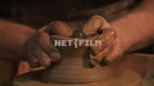 Potter makes a jug on a pottery wheel, close-up.
Potter, pottery , crafts, craft, clay, folk craft,...