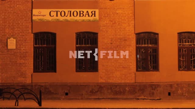 Evening.
Vehicles drive past a closed dining room px.
Russia, night, canteen, px, people, light,...