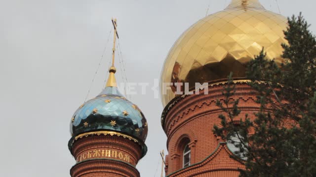 Close-up of the dome.
Russia, Orthodoxy, Christianity, dome, gold, blue, cross, star, pine, tree,...