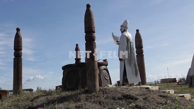 Yakut priest conducts the ceremony in a sacred place. Yakut priest conducts the ceremony in a...