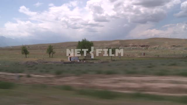 The passage of the car across the steppe. The passage of the car across the steppe.
Steppe, clouds,...