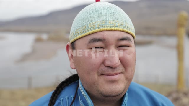 Portraits.
Men in traditional Tuvan garb on a background of mountains, throat singing, Mountains,...