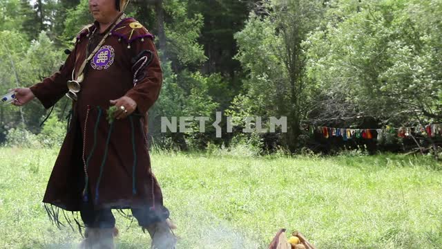 The Supreme shaman of Russia Dopchun Kara-ool, Tulasiewicz on the ritual feeding of the spirits,...