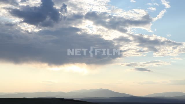 Sky, clouds, nature, dark mountains in the distance Sky, clouds, nature, dark mountains in the...
