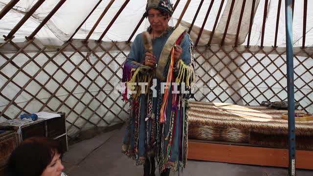 Shaman ritual in the Yurt holds a rite of passage
Shamanism, rituals, customs, Tuva Shaman ritual...