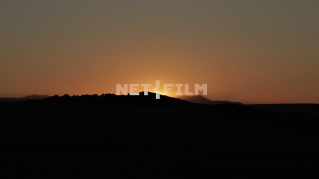 The sunset, the Sun goes behind a low hill, nature, sky The sunset, the Sun goes behind a low hill,...