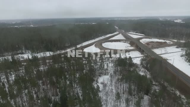Top view of the motorway junction.
Car, winter, drone, forest, pine, road, snow, stripes, road...