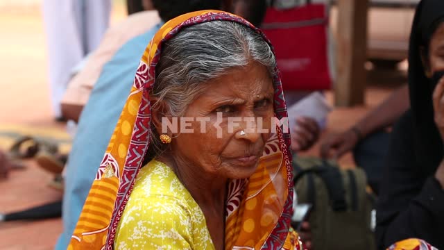 Elderly the Indian woman in national clothes Elderly the Indian woman in national dress, portrait,...