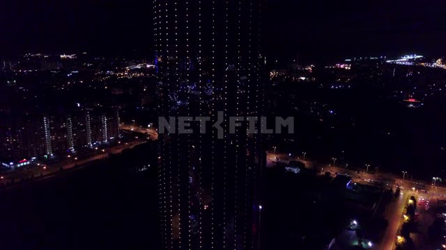 Екатеринбург, ночные виды центра города, съемка небоскреба с движением вниз-вверх...