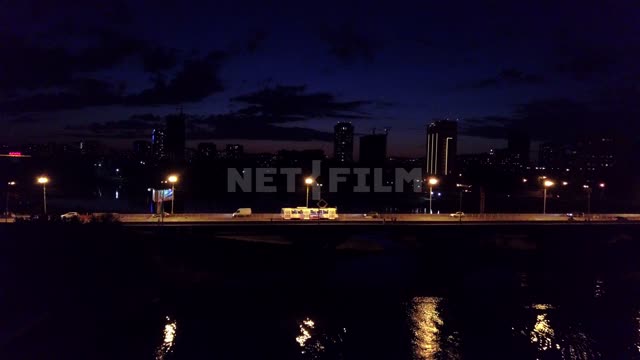 Съемка ночного Екатеринбурга с квадрокоптера Ночной город.
Мост.
Река.
Высотные здания.