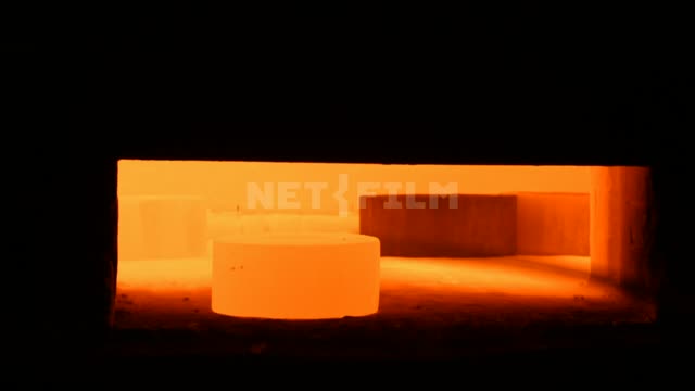 Smith and hot steel in the blast furnace Caster, Factory, Foundry, Hot steel
