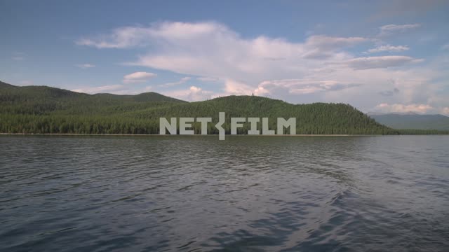 View from the boat on the shore of lake Baikal and the taiga Russia, Siberia, Baikal, Buryatia,...
