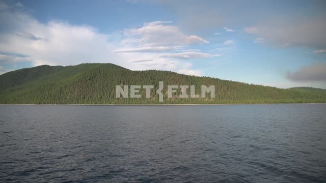 View from the boat on the shore of lake Baikal and the taiga Russia, Siberia, Baikal, Buryatia,...