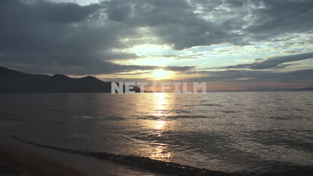 Sunset on the lake Russia, Siberia, Baikal, Buryatia, beach, coast, nature, landscape, summer,...