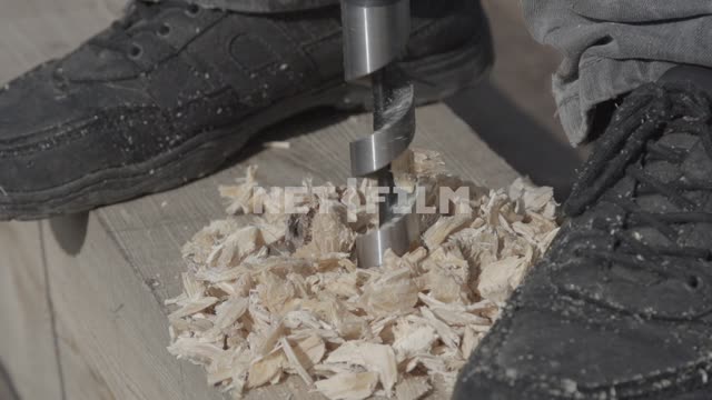 Slow motion, large drill bit drills into the wood.
Close-up, slow motion, drill, drill, Board,...
