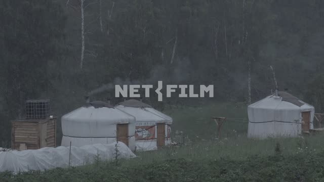 Three of the Yurt in the rain.
Yurt, Yurt, Siberia, mountains, nomads, pipe, smoke, rain, evening,...