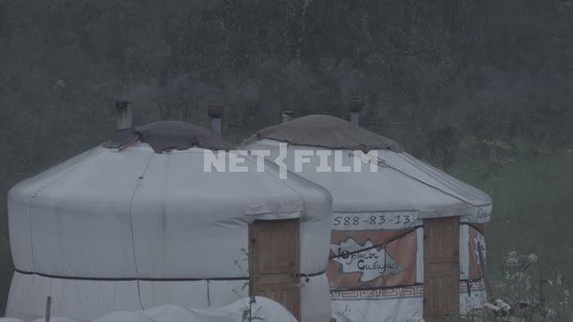 The Yurt in the rain.
From the chimneys smoke.
Yurt, Yurt, Siberia, mountains, nomads, pipe, smoke,...
