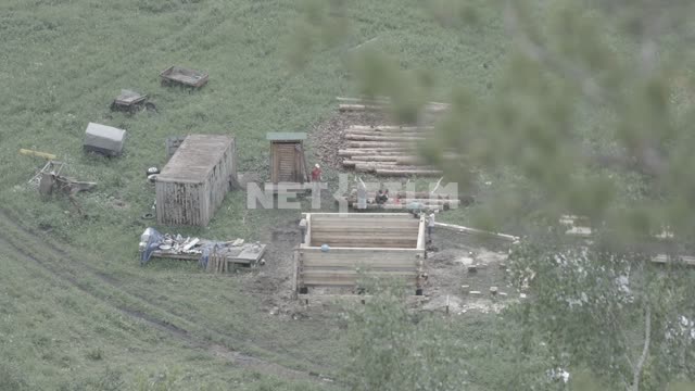 The construction of a wooden house, the view from the top.
The field of construction, log, logs,...