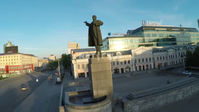 Views of the empty city, the camera moves past the monument to Lenin.
Russia, Yekaterinburg, city,...