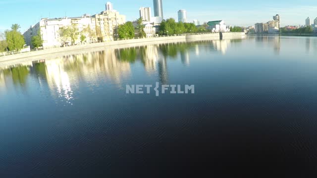 Drone flies over the water to the City pond in Yekaterinburg.
Russia, Yekaterinburg, spring,...