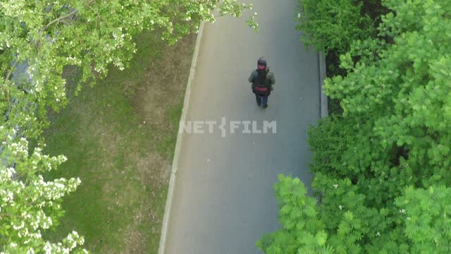 The camera moves over the road, the path is a man, the camera follows him.
Top view, Russia,...