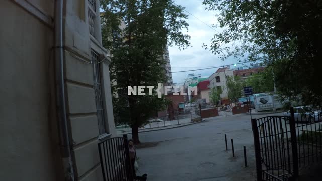 Desert town.
The camera runs through the arch from the yard to the street and back.
Russia,...