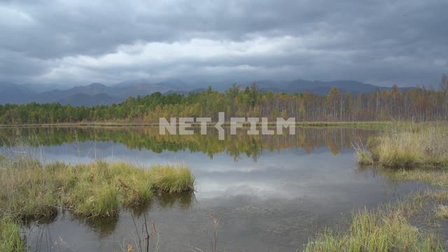 Lake in Eastern Siberia, autumn landscape, cloudy Russia, Siberia, Baikal, Barguzin valley, nature,...