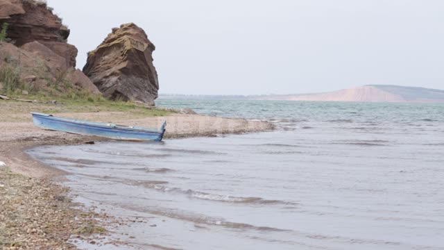 Aslikul Lake (Asylykul), a boat on the shore Lake, Water, Pond, Waves, Shore, Surf, Rocks,...