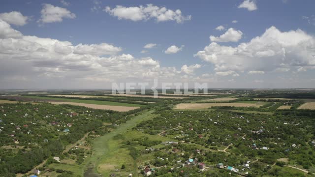 Aerial photo of country towns in the South of Russia, in the distance, wheat fields
Location:...