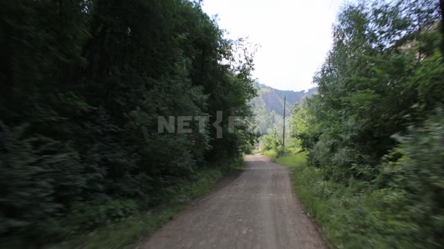 travel through the natural Park Muradymovsky gorge. Transportation, road, car, nature, mountains,...