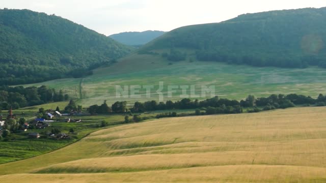 Nature of the Urals, panorama of a mountain valley Suleymanovo, mountains, hills, valley, meadow,...