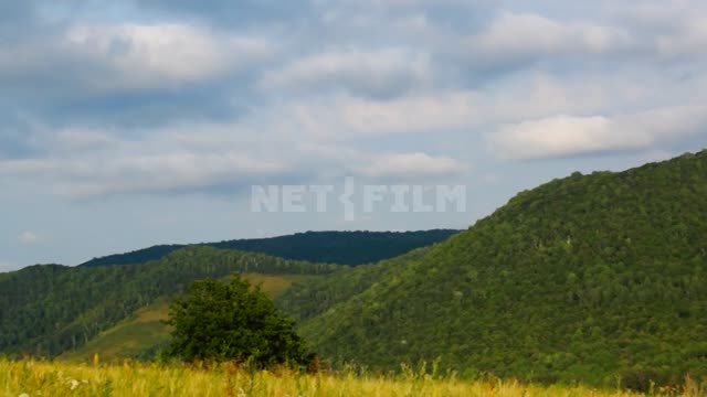 Nature of the Urals, mountain meadow Suleymanovo, mountains, hills, valley, forest, trees, meadow,...