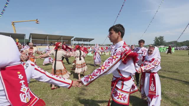 National holiday, round dances on the field Ural, Salavatsky district, holiday, national costume,...