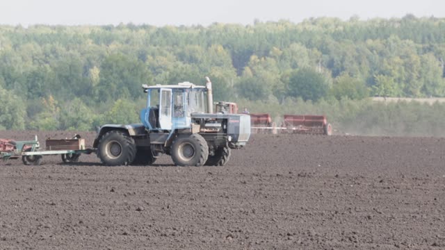 Field work, tillage, sowing Ural, agriculture, field, arable land, field work, sowing work,...