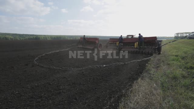 Field work, tillage, sowing Ural, agriculture, field, arable land, field work, sowing work, chain,...