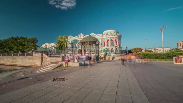 Gazebo and people walking near the House Sevastyanova in Yekaterinburg. Time lapse
The...