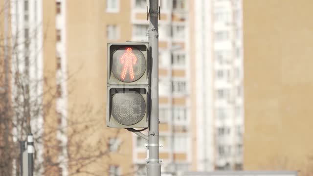 Pedestrian traffic light, the end of the pedestrian crossing.
The red light turns on quarantine,...