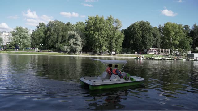 Gorky Park, riding in a pond on catamarans Gorky Park, Central Park, pond, water, catamaran,...