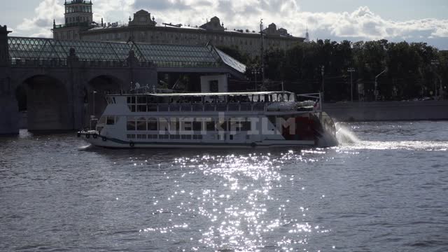 Moscow River, a paddle steamer enters under the Pushkin Bridge Moscow River, Pushkinsky...