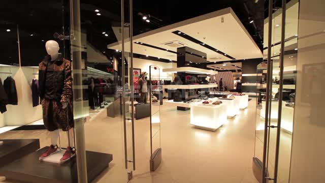 Clothing and footwear store, sales hall Shop, shopping center, clothing, shoes, shelves, display...