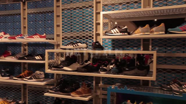 Clothing and footwear store, sales hall Store, shopping center, shoes, sneakers, shelves