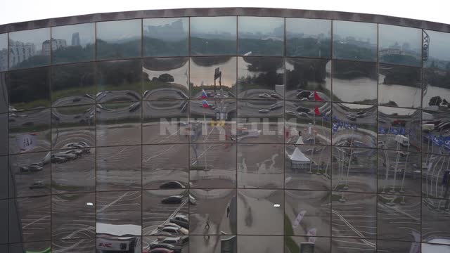 The movement of cars is reflected in the glass Glass, windows, panoramic glazing, cars, reflection