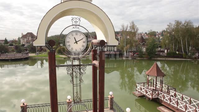 Cottage village, big clock on the pond embankment Pond, pond, embankment, lights, clock,...