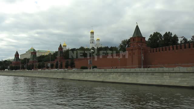 Moscow River, exit from under the bridge with a view of the Kremlin Kremlin, Kremlin wall, towers,...